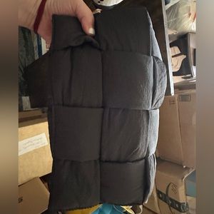 Like new. Black padded INSPIRED black bag with shoulder/crossbody strap